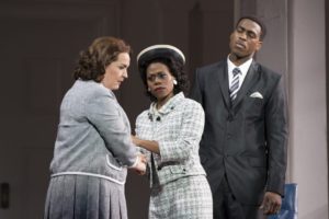 Melody Moore as Viola Liuzzo, left, Chrystal E. Williams as Coretta Scott King, center, and Soloman Howard as Martin Luther King, Jr. , right. The two ladies shake hands with concerned faces as Howard looks on.